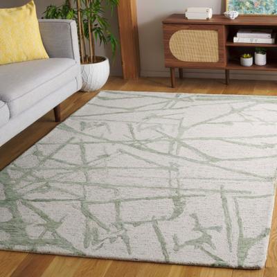 SAFAVIEH Hand-Tufted Ebony Gyulnara Modern & Contemporary Wool Rug