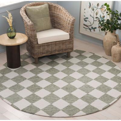 SAFAVIEH Hand-Tufted Ebony Todosia Modern & Contemporary Wool Rug