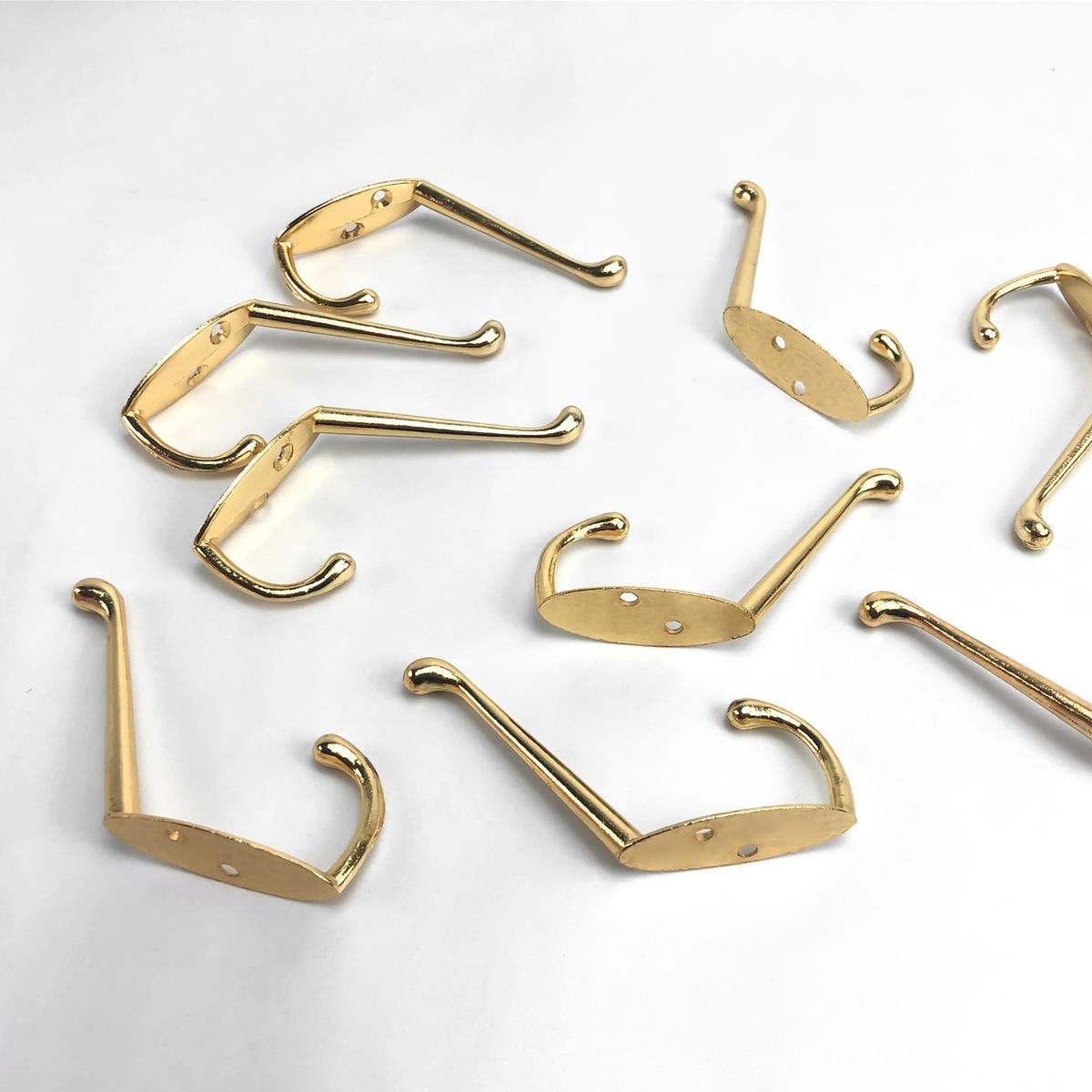 Set van 9 goudkleurige metalen wandhaken met dubbele vorkvorm