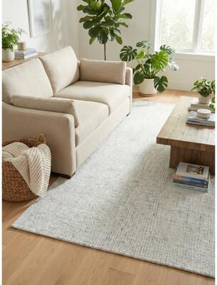 EXQUISITE RUGS Caprice Hand-tufted New Zealand Wool Blue/Ivory Area Rug.