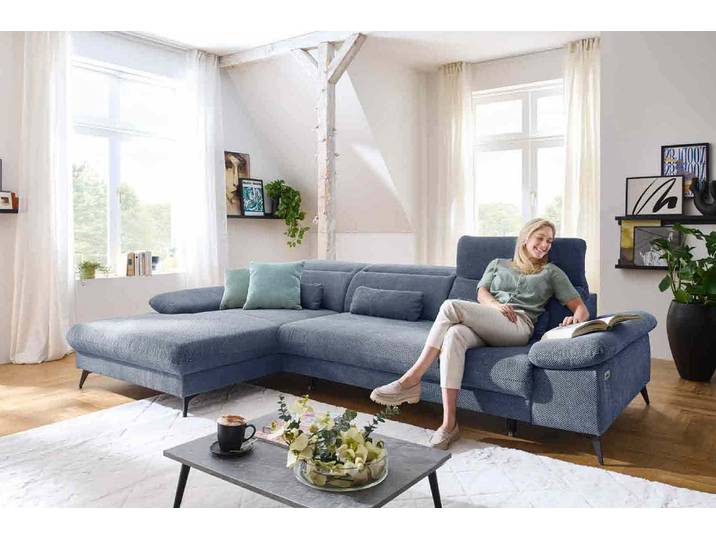 Ecksofa mit motorischen XL- Sitzvorzug in Stoff