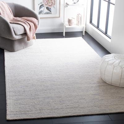 SAFAVIEH Handmade Himalaya Caitlyn Modern Wool Rug