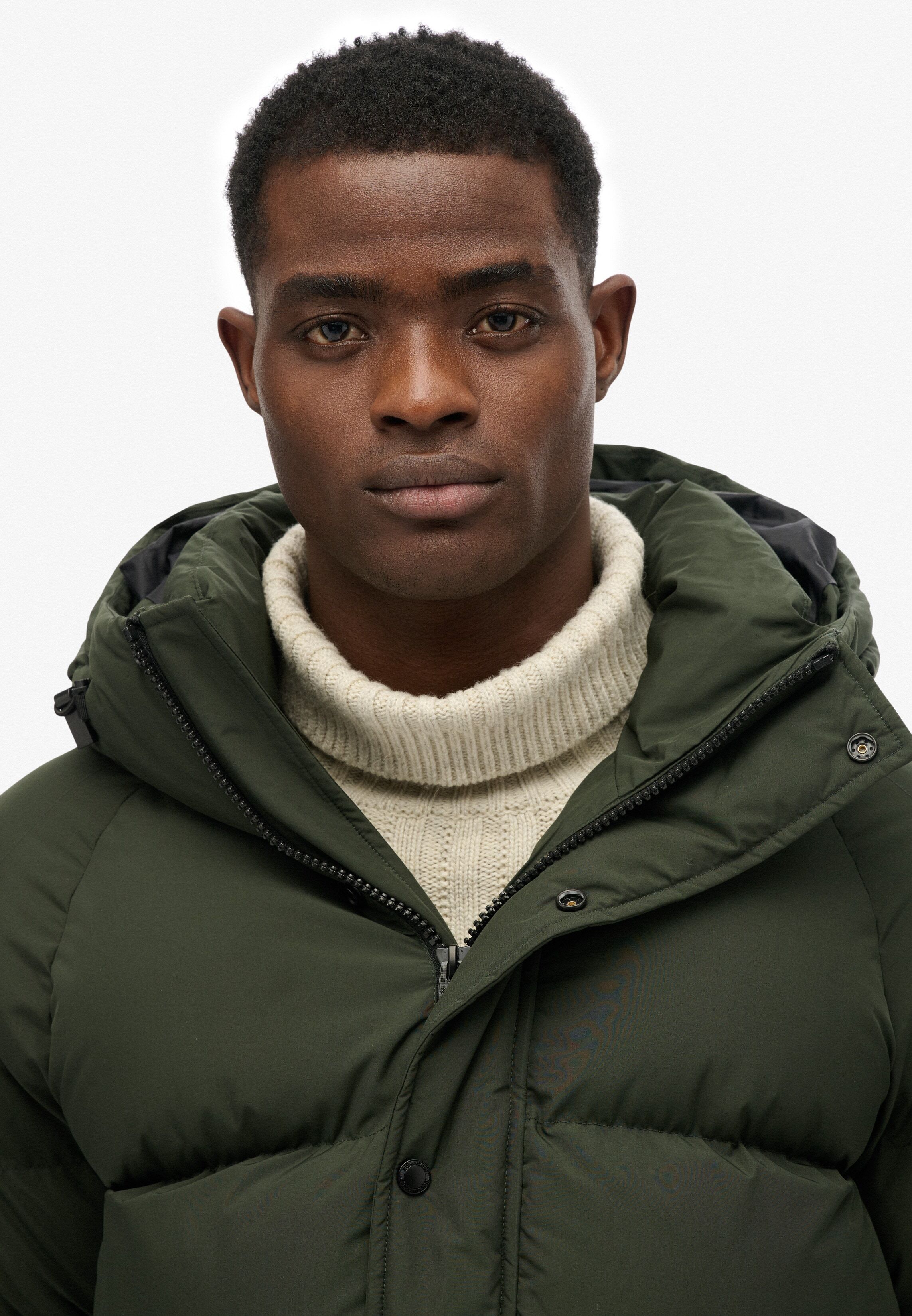 Steppjacke SUPERDRY "XPD LONGLINE BAFFLE PARKA", Herren, Gr. XL, grün (surplus goods olive grün), Web, Obermaterial: 100% Polyester, unifarben, oversize, Jacken Steppjacke, mit Markenlabel, aus Polyester, pflegeleicht, Oversize-Passform surplus goods oliv