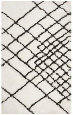 SAFAVIEH Handmade Toronto Shag Mizuki Polyester Rug