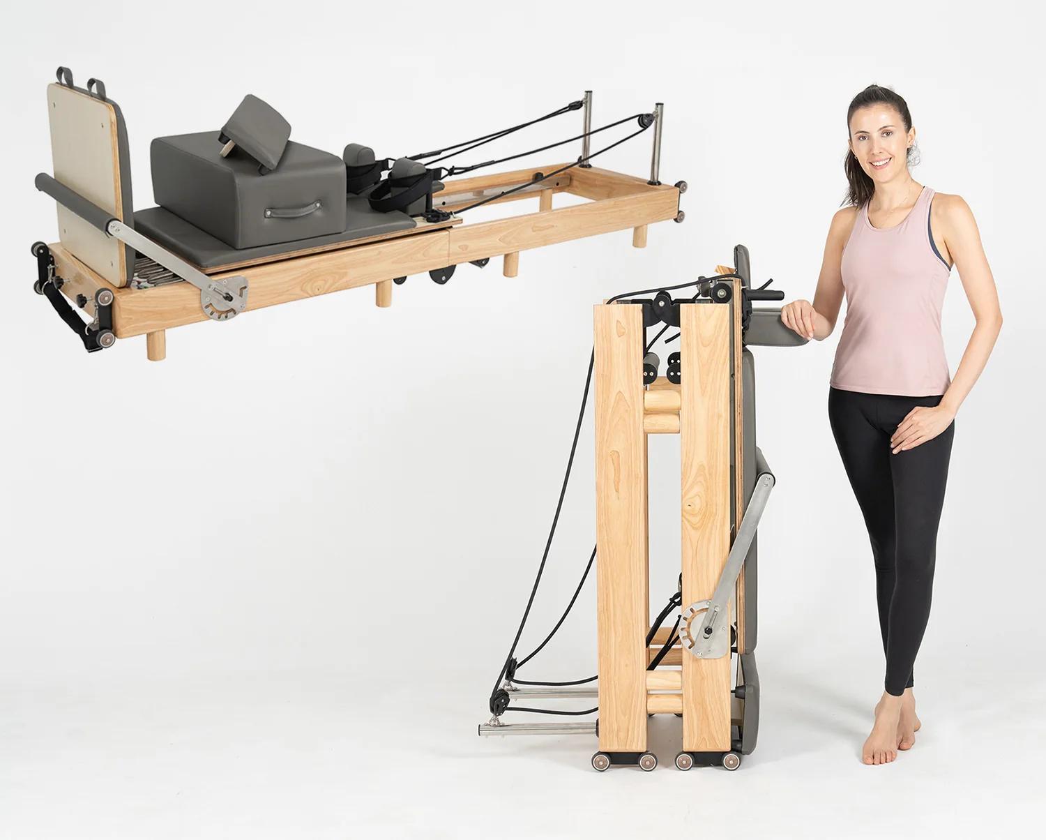 Pilates Reformer - Trainingsgerät - Klappbarer Holzrahmen - Verstellbarer Widerstand - Für Zuhause - Krafttraining - Brusttraining