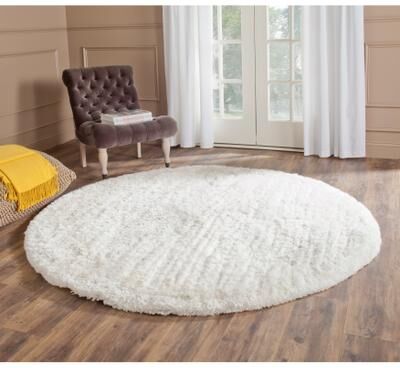 SAFAVIEH Handmade South Beach Leonella Shag Solid Polyester Rug