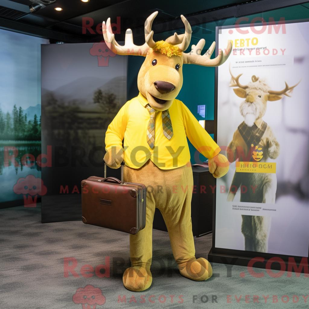 Maskottchen REDBROKOLY eines gelben irischen Elchs mit Bluse und Aktentasche