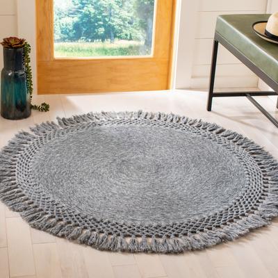 SAFAVIEH Handmade Sahara Promila Tassel Rug