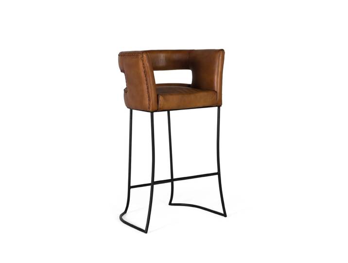 Tabouret recouvert de cuir naturel avec structure métallique incurvée