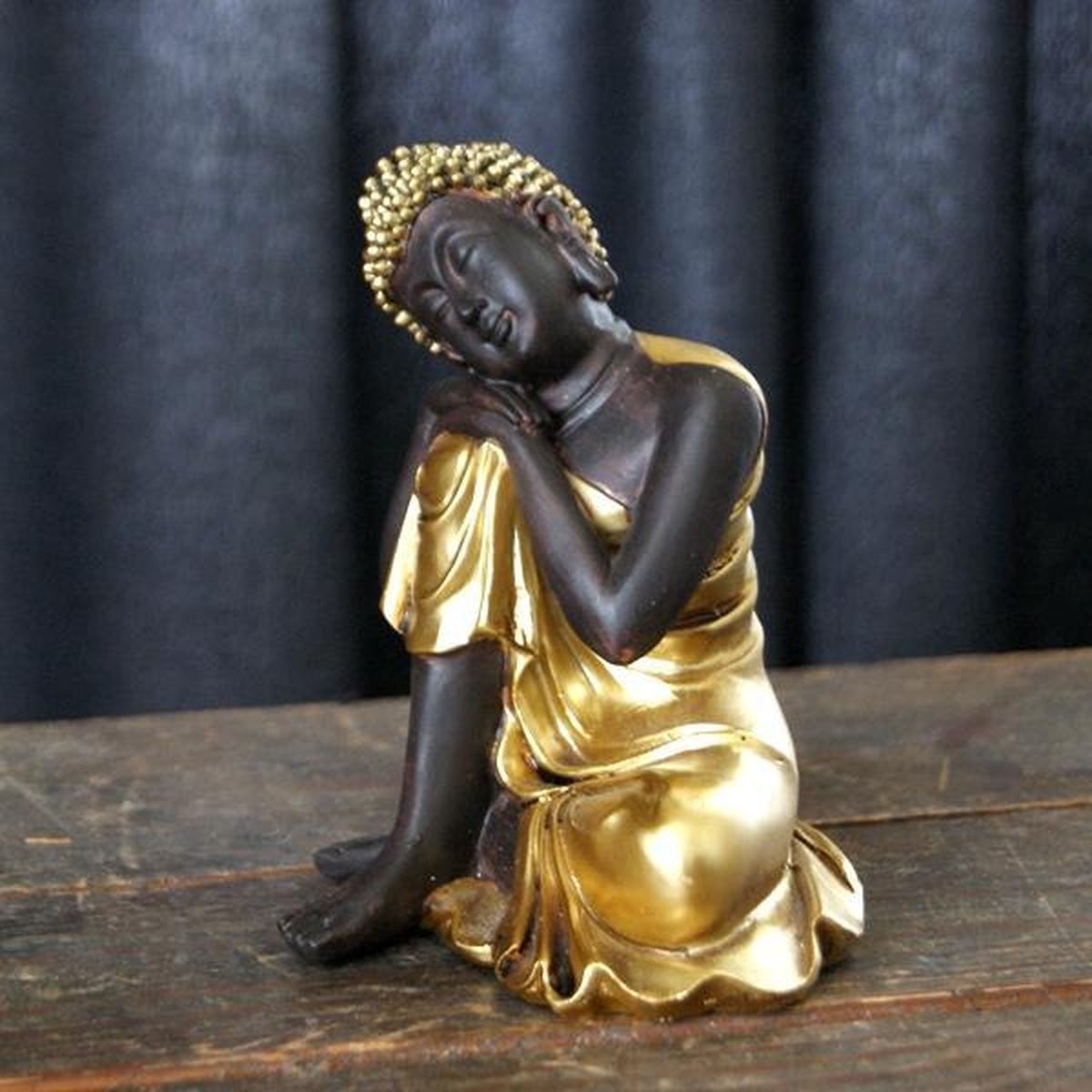 Zittende Thaise Boeddha voor op tafel
