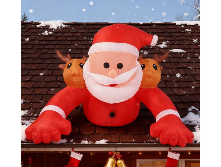 Père Noël gonflable couché sur le toit avec deux cerfs sur ses épaules pour le jardin intérieur et extérieur du festival de Noël