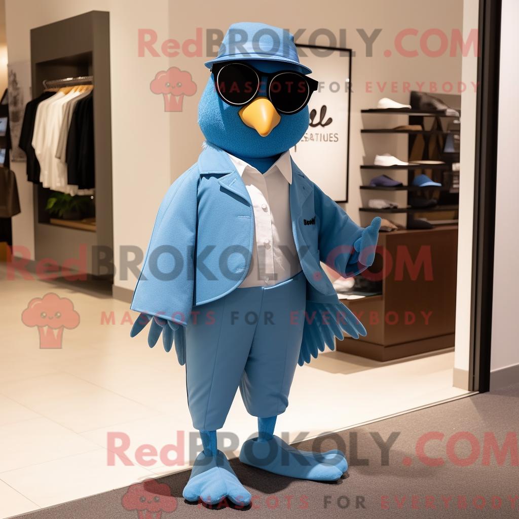 Maskottchenfigur REDBROKOLY eines blaugrünen Eichelhähers mit Culotte und Aktentasche