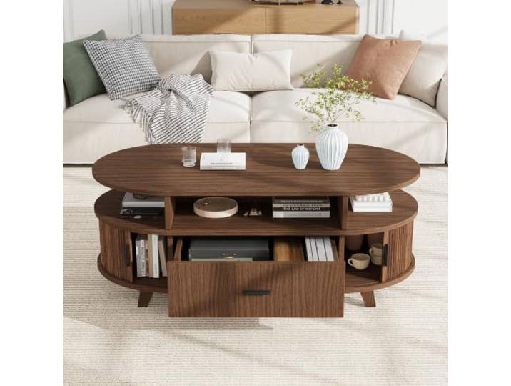 Merax Couchtisch oval 100x50x40 cm, Walnussoptik, Schublade & 2 Rolltüren Ovaler Couchtisch in Walnussoptik mit Schublade, 2 Rolltüren und offenen Fächern für praktischen Stauraum.