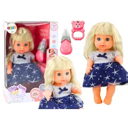 Puppe im marineblauen Kleid pinkelt mit Flaschenrasselgeräuschen