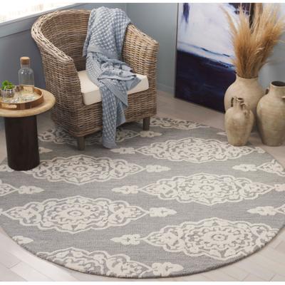 SAFAVIEH Handmade Ebony Asena Modern Wool Rug