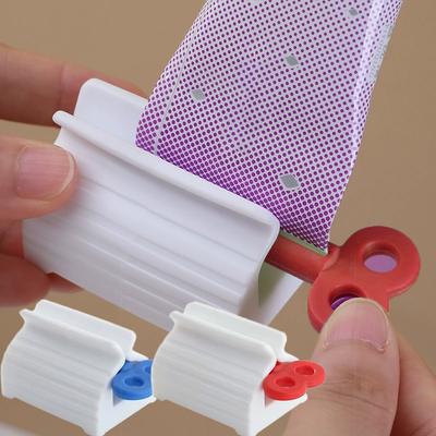 Discount Dollar Deals Toothpaste Squeezer And Multifunctional Tube Dispenser Press Bathroom Accessory Tool red