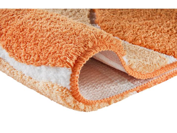 Badematte MEUSCH Lara , orange (karotte), H:20mm, Polyester, Badematten, Badematte, Wellen-Design mit flauschigen weißen Akzenten
