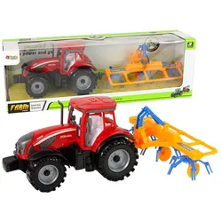 Roter Traktor mit Schwader-Reibradantrieb