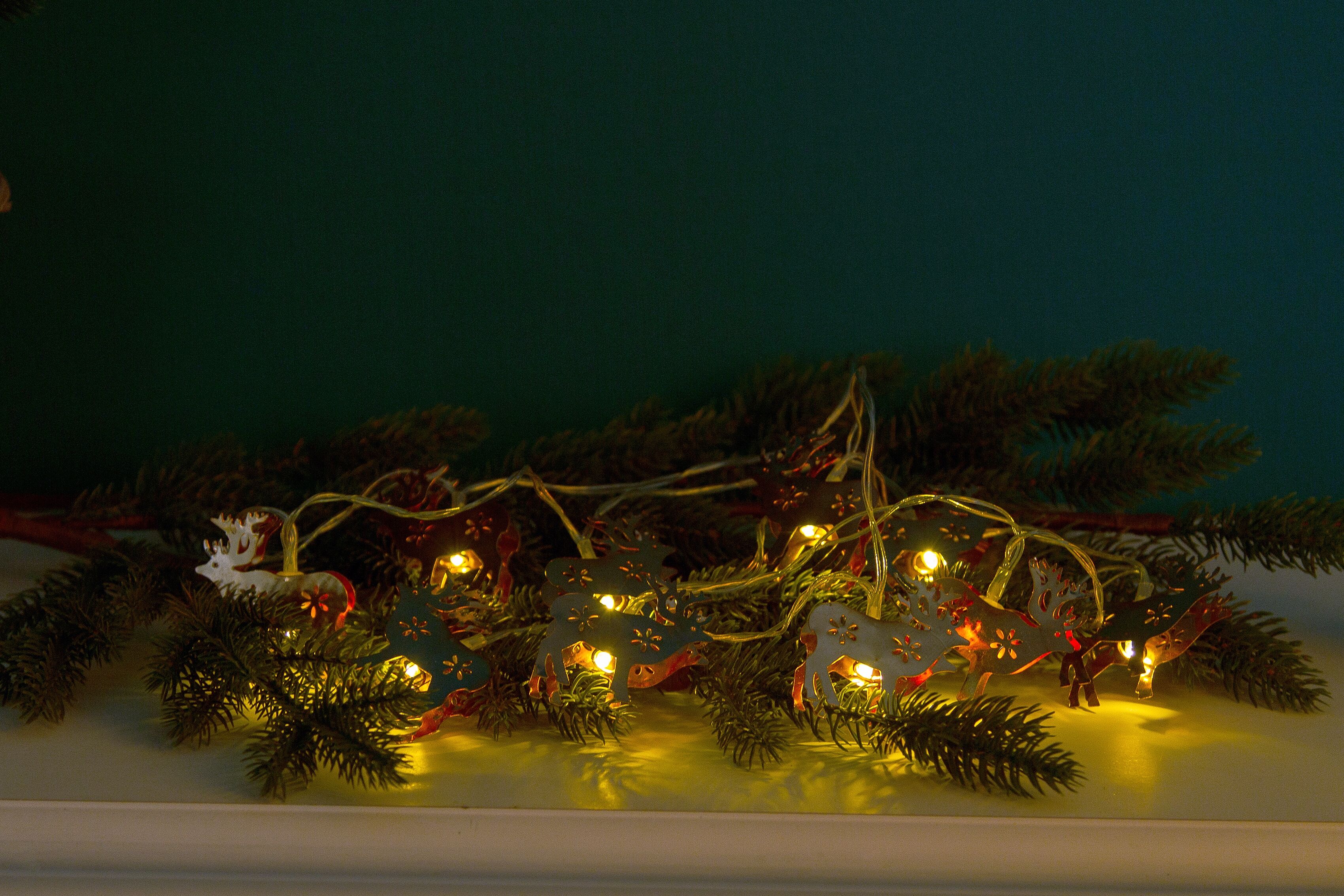 Dekoobjekt "Weihnachtsdeko", rosa (roségoldfarben), MYFLAIR MÖBEL & ACCESSOIRES, Dekofiguren, LED-Lichterkette mit Rentieren, mit 10 LEDs, Länge ca. 150 cm, Dekoobjekt