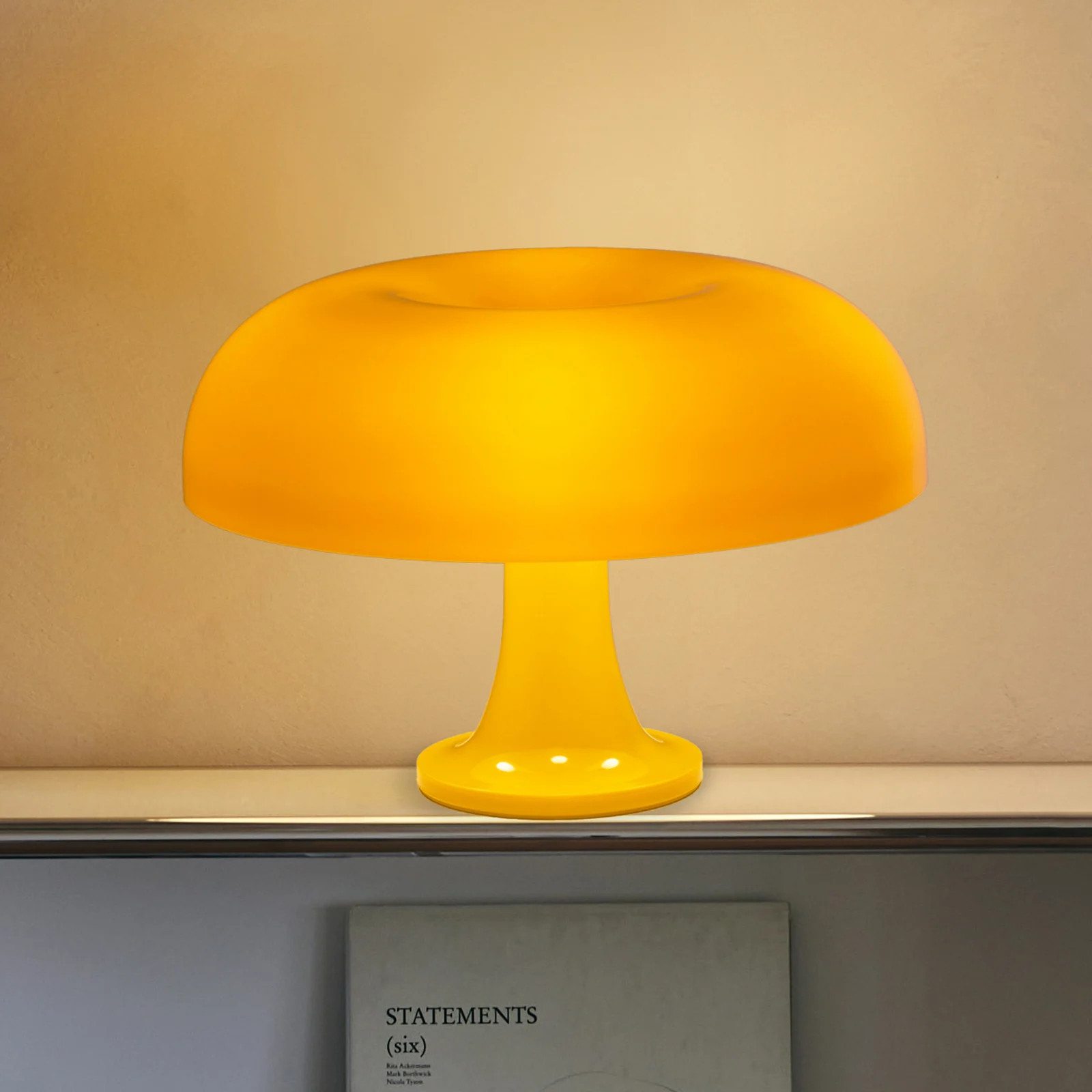 Artemide Nessino tafellamp, geel, Ø 32 cm
