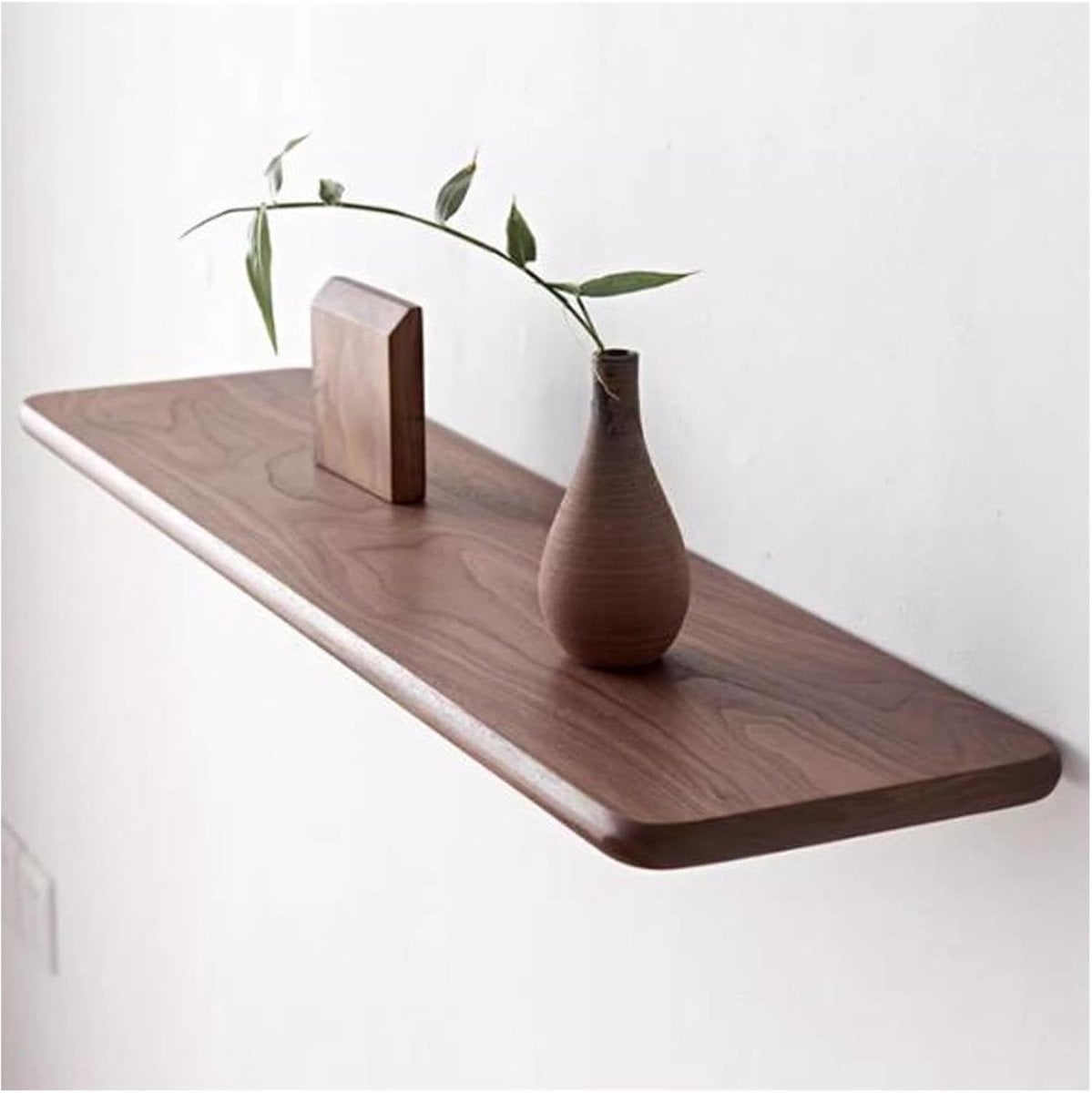 Drijvende wandplanken van massief walnoothout in walnootkleur voor decoratie en opslag