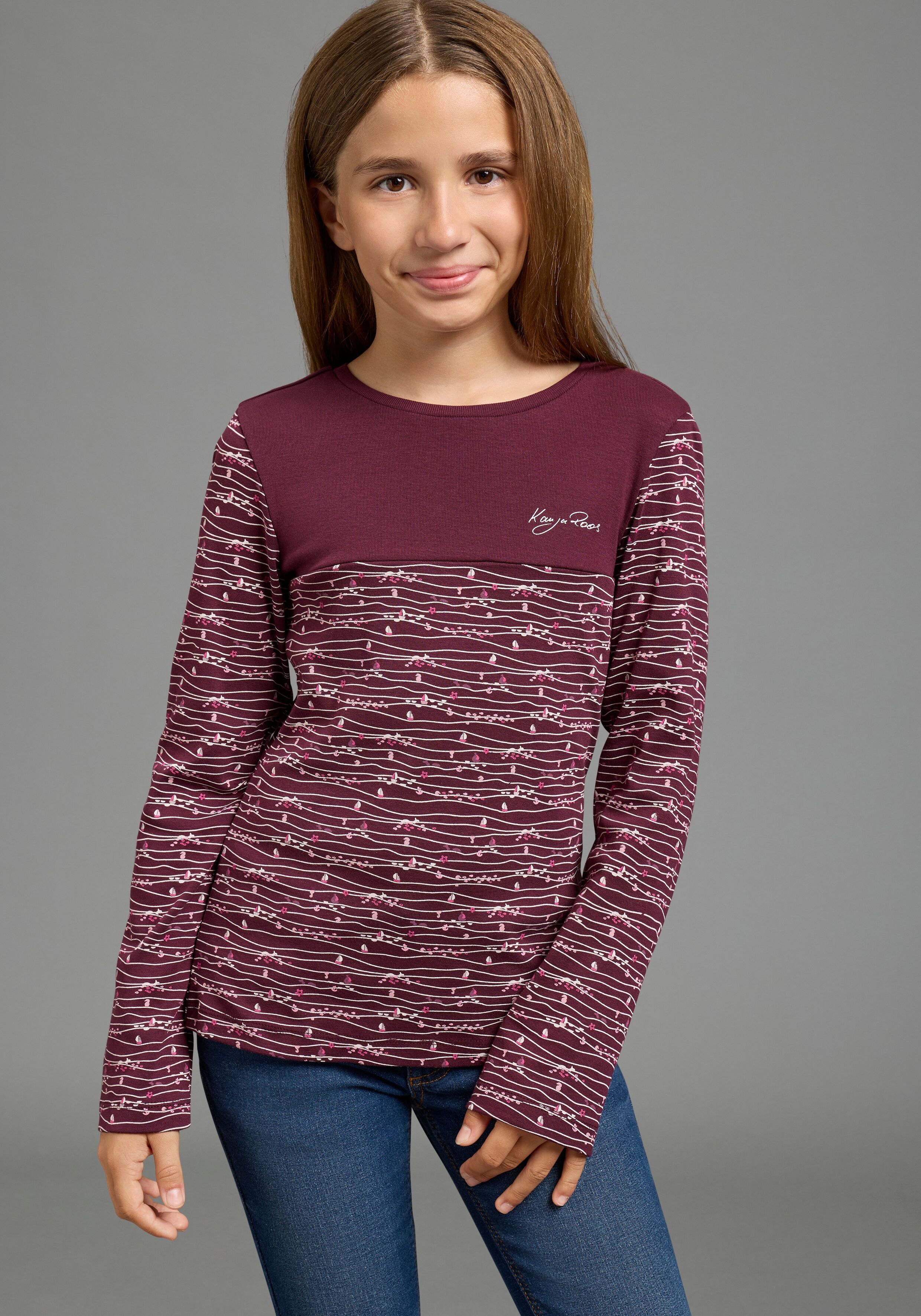 Langarmshirt KANGAROOS "Shirt mit Allover-Druck und kontrasfarbigem Einsatz von KangaROOS", Mädchen, Gr. 164/170, bunt (bordeaux gem), Feinripp, Obermaterial: 100% Baumwolle, bedruckt, eng hüftlang, Rundhals, Shirts Langarmshirt, mit Langarm, hüftlang, en