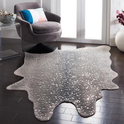 SAFAVIEH Faux Cow Hide Rosl Animal Rug