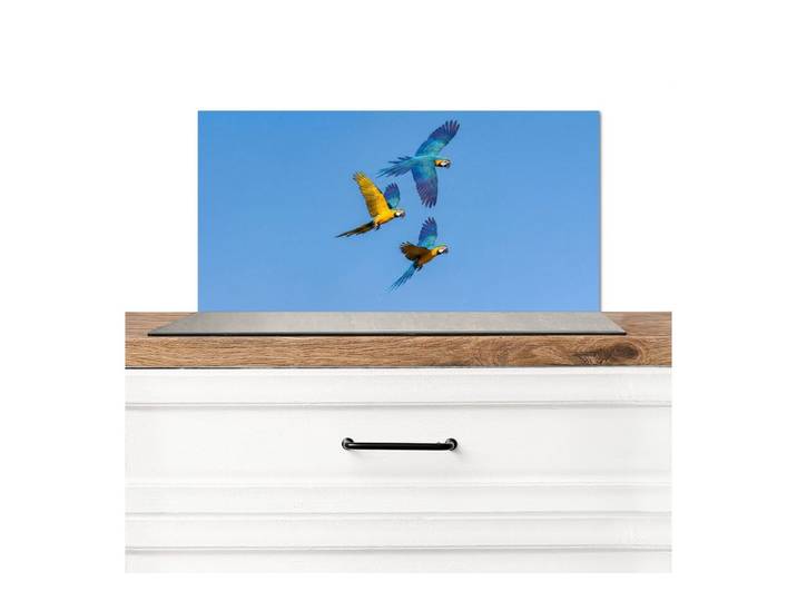KitchenYeah Küchenrückwand Papagei - Fliegen - Blau - Gelb, (1-tlg), Küchen rückwand, Küchenwand Verkleidung, 90x60 cm