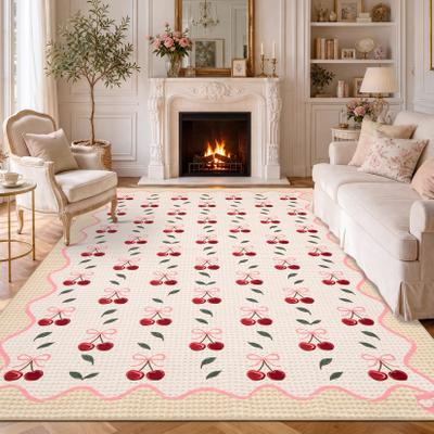 Garvee Scalloped Border Cherry Bow Area Rug