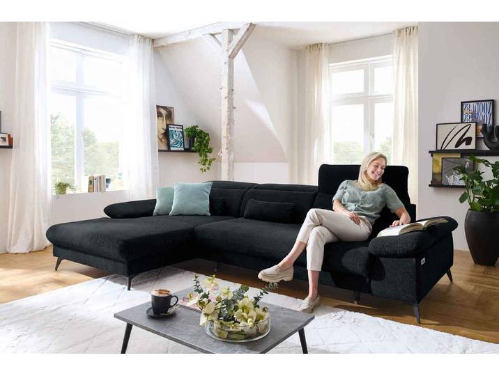 Ecksofa mit motorischen XL- Sitzvorzug in Stoff