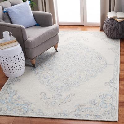 SAFAVIEH Handmade Micro-Loop Mjoll Wool Rug