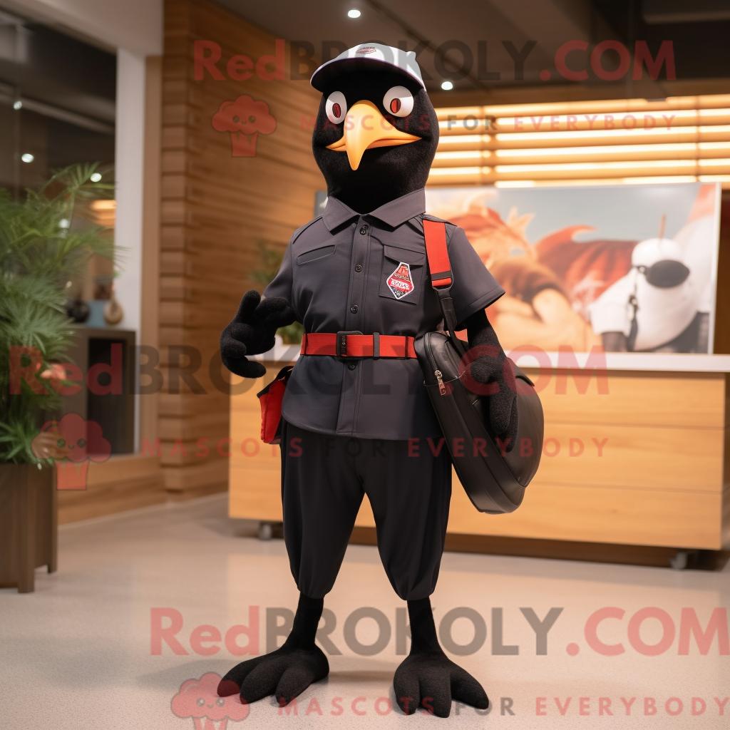 Maskottchenfigur REDBROKOLY eines Schwarzspechts mit Overall und Messengerbag