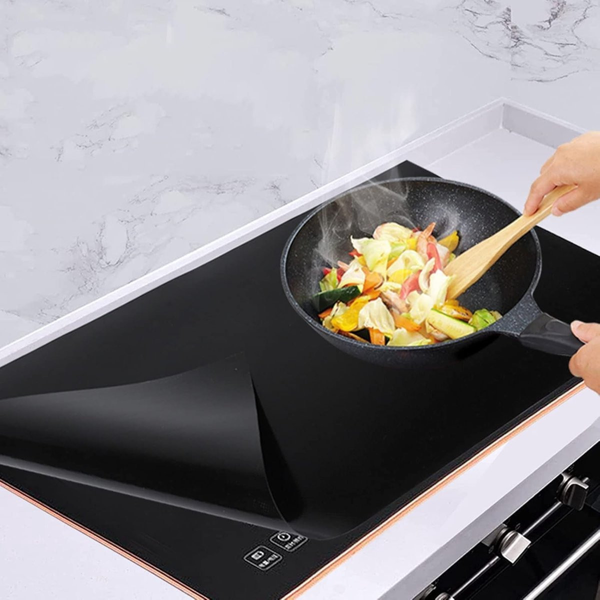 Zwarte antislip beschermmat van siliconen voor inductiekookplaten, 52 x 78 cm