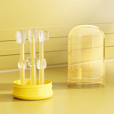 Inspired Finds Portable 3 Piece Silicone Baby Toothbrush Set With Wash Cup yellow