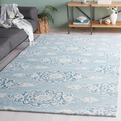 SAFAVIEH Handmade Ebony Asena Modern Wool Rug
