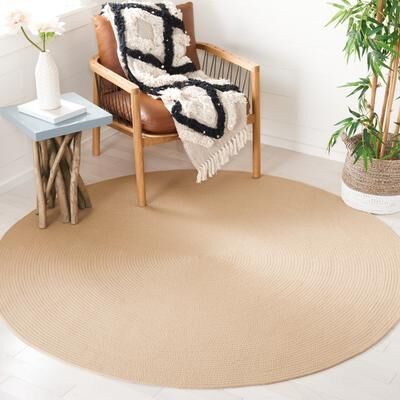 SAFAVIEH Handmade Braided Thanja Rug
