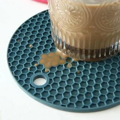 Uplift Picks HeatShield Round Silicone Coaster And Heat Resistant Kitchen Mat HeatShield Round Silicone Coaster And Heat Resistant Kitchen Mat
