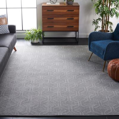 SAFAVIEH Plain and Solid Zohre Geometric Rug