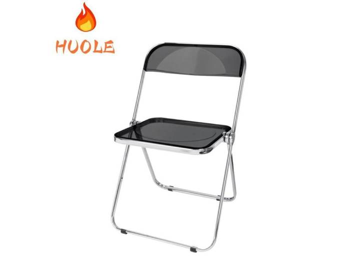 Chaise pliante en acrylique noire empilable et élégante sans accoudoirs pour la salle à manger ou le salon.