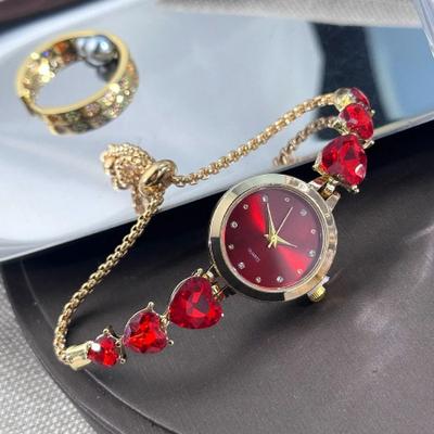 Uplift Essentials Triple Heart Diamond Encrusted Bracelet Watch Elegant Light Luxury Quartz Timepiece With Round Alloy Case red