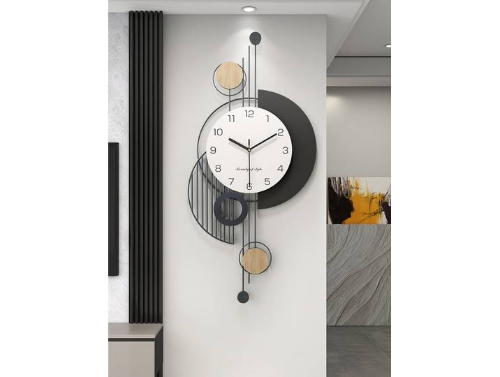 Horloge murale salon 2025 nouvelle lumière luxe haut sens moderne simple atmosphère horloge créative horloge murale poinçonnage gratuit