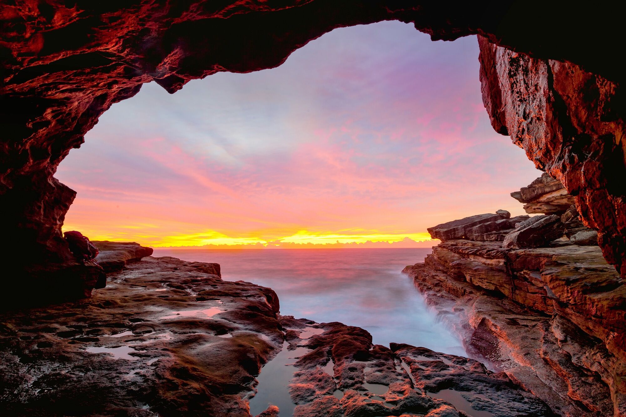 Fototapete PAPERMOON "GROTTE-FELSEN HÖHLE SONNENAUFGANG KÜSTE OZEAN MEER", bunt, B:1,5m L:1,11m, Vlies, Tapeten, Fototapete bunt B/L: 1,5m x 1,11m, Bahnen: 7 Stk.