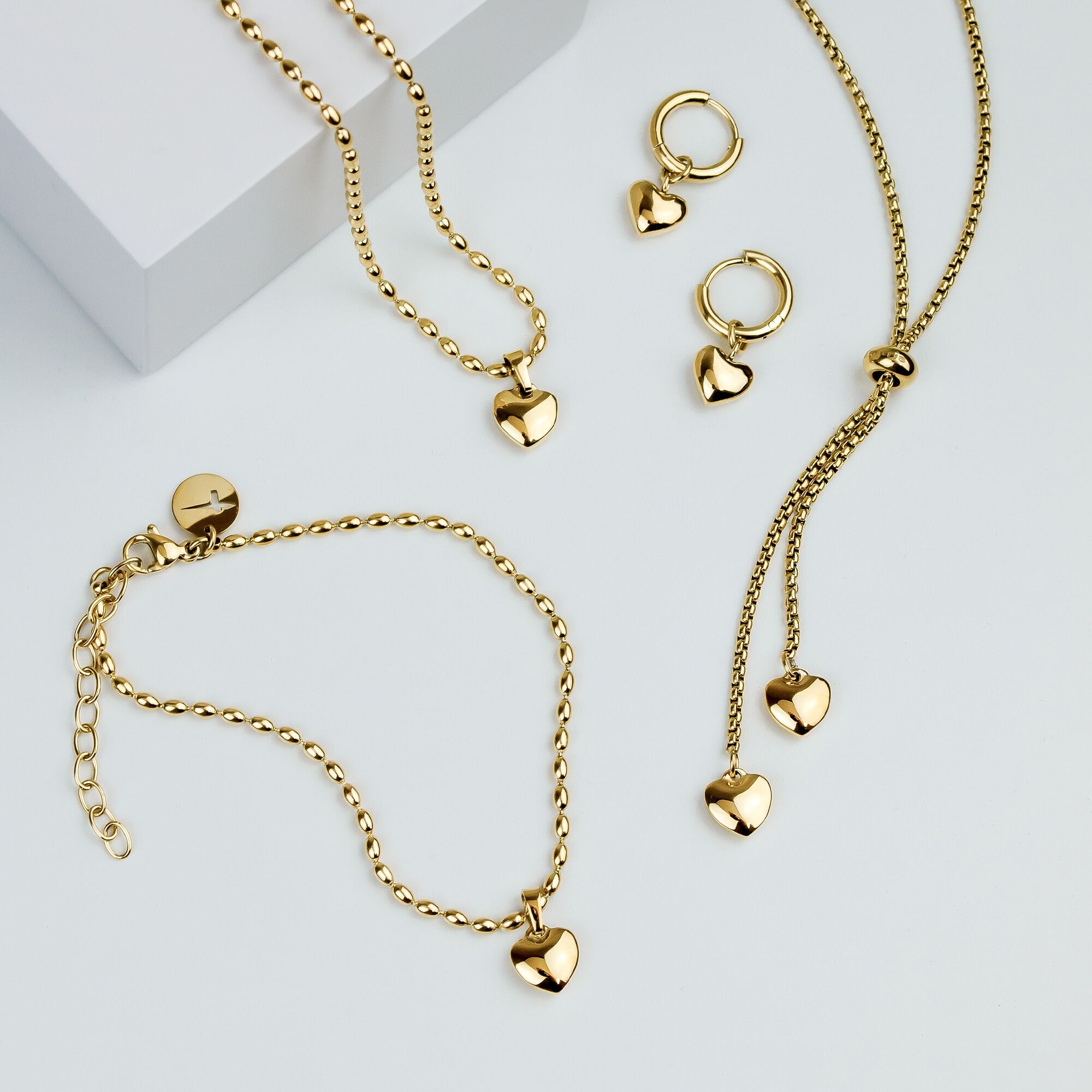 Paar Creolen TAMARIS "Edelstahl Schmuck mit abnehmbaren Herz-Einhängern Tiny Heart", gelbgoldfarben, Ohrringe, Damen, 12mm, Edelstahl