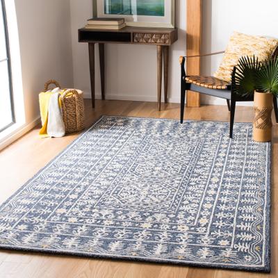 SAFAVIEH Handmade Micro-Loop Genowefa Wool Rug
