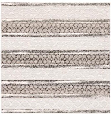 SAFAVIEH Handmade Natura Kimi Wool Braided Tassel Rug