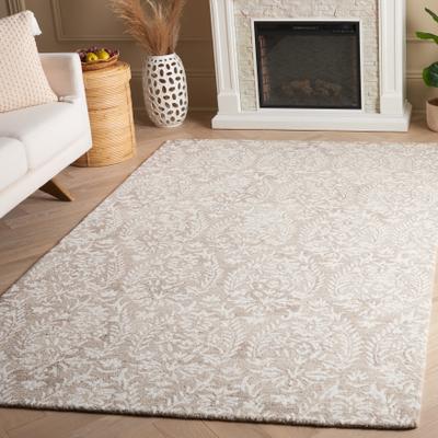 SAFAVIEH Hand-Tufted Ebony Melia Modern & Contemporary Wool Rug