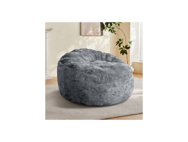 Fauteuil pouf incurvé à dossier haut offrant un soutien corporel complet pour une détente immersive dans un intérieur moderne