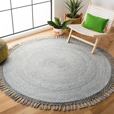 SAFAVIEH Handmade Sahara Promila Tassel Rug