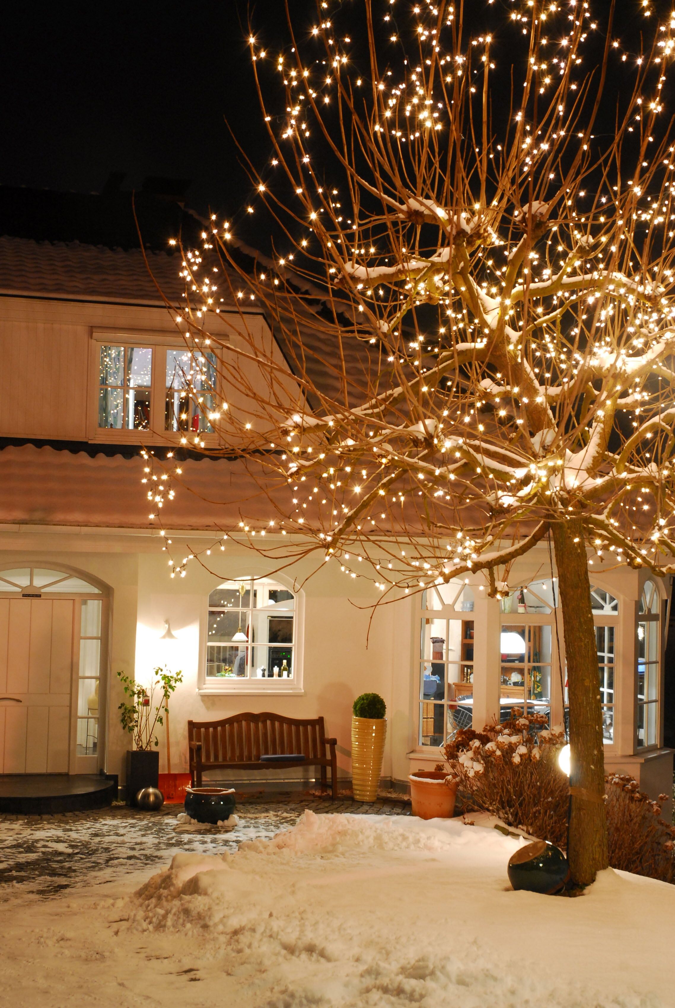 KONSTSMIDE LED-Lichterkette "Weihnachtsdeko aussen", Energieeffizienz: G (A-G), grün, Dioden 40 Stk. Flammen 40 Stk., Gesamtlänge 13,85m, Lichterketten, LED Minilichterkette, 40 warm weiße Dioden