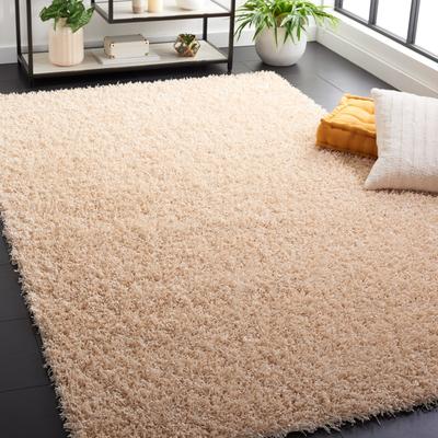 SAFAVIEH Handmade Monterey Shag Mevlide Solid Polyester Rug